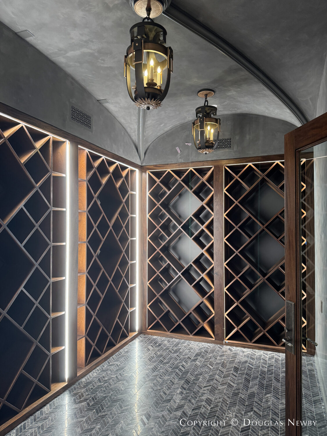 The wine cellar on the below-grade floor at this architect-designed estate home at 4400 Belfort Place in Highland Park, Dallas, Texas .